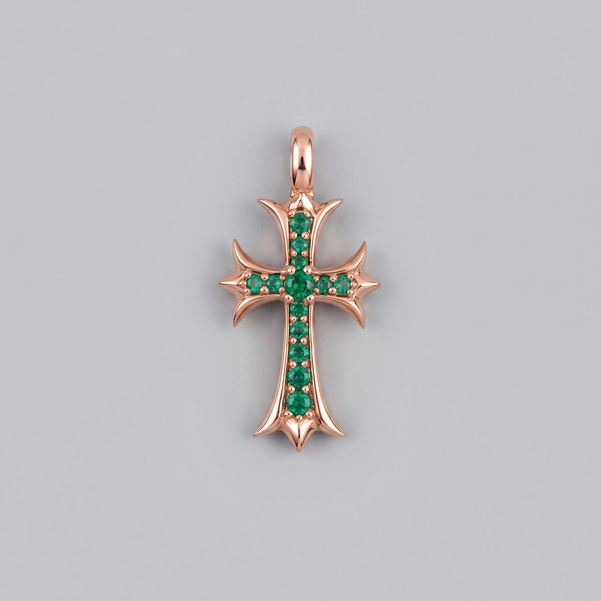Cruz Gótica con Esmeraldas en oro rosa 18k